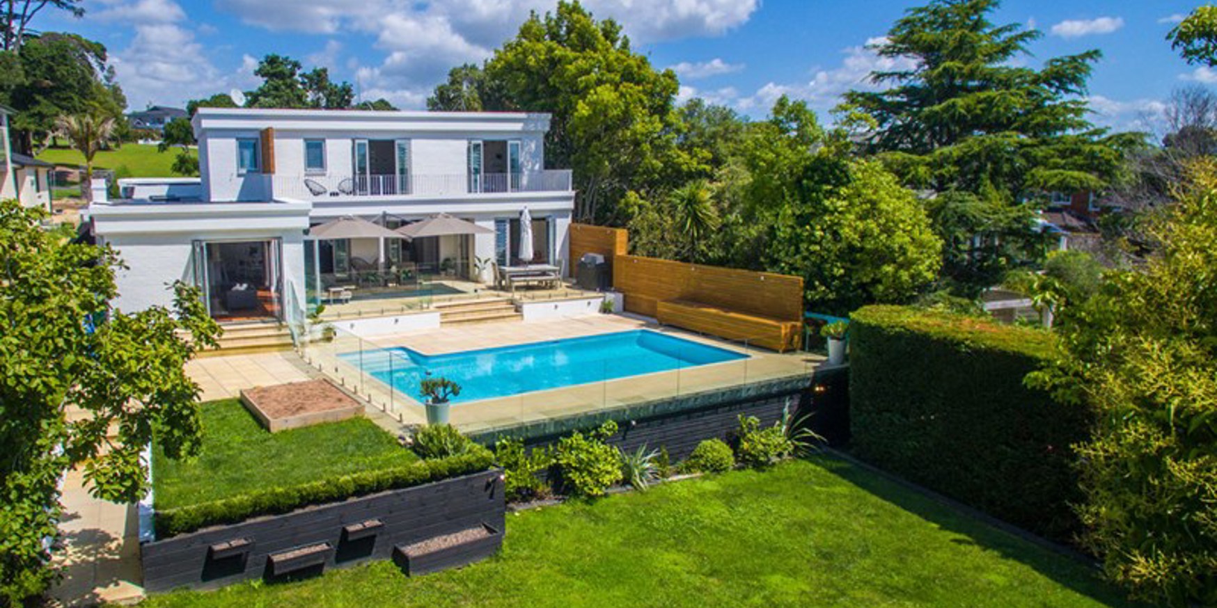 A beautiful 1950s brick home sitting high on Kohimarama Road.